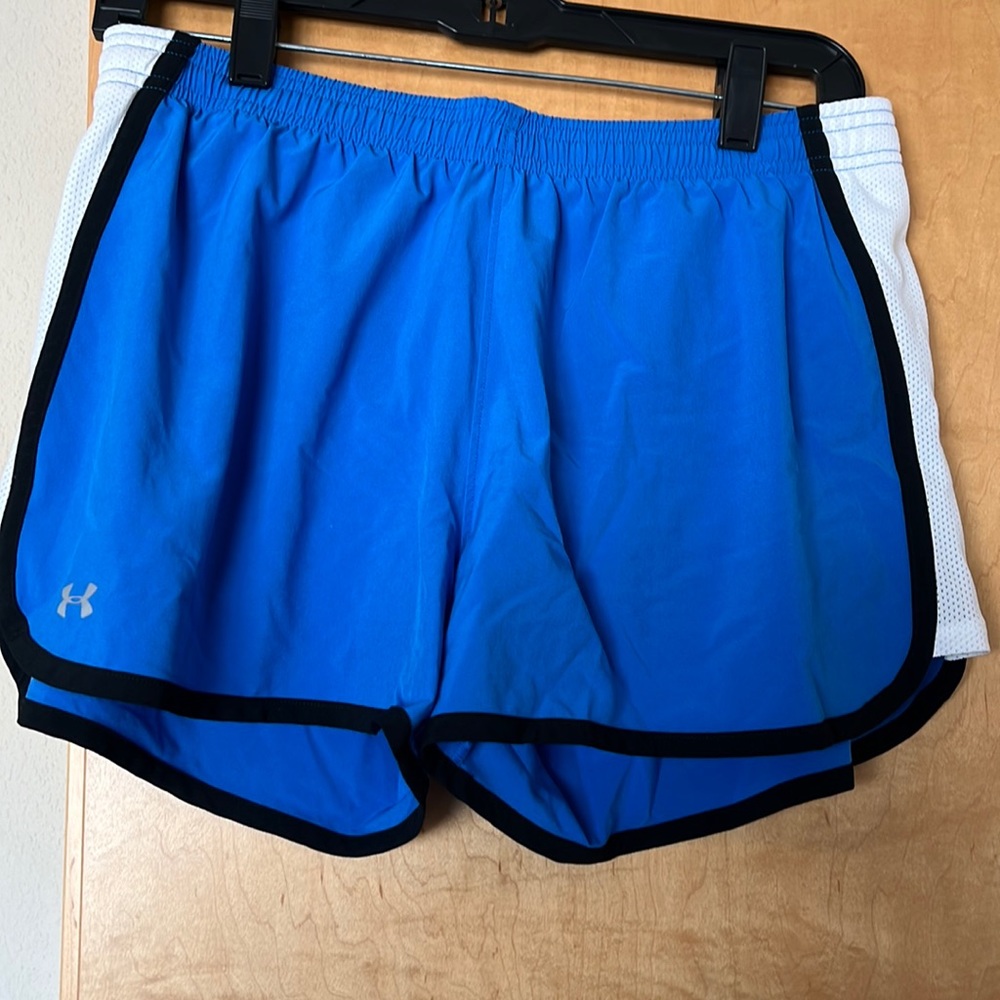 Women’s Under Armour Blue Running Shorts - size M.